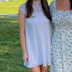 Mini light bluish gray chiffon dress.
